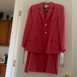 Rena Nowan salmon colored suit